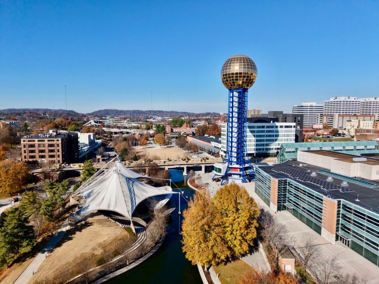 The gold Sunsphere tower at World's Fair Park in downtown Knoxville, Tennessee, surrounded by fall foliage